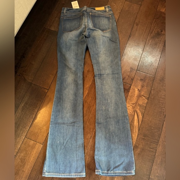 Michael Kors Medium Wash Faded Denim Low-Rise Flared Jean - Picture 5 of 6